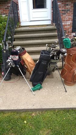 6 sets of golf clubs