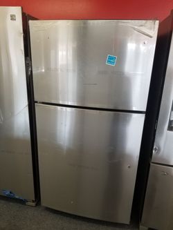 New scratch and dent Whirlpool 21cu.ft top mount fridge stainless steel wit ice maker 1 year warranty