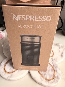 Brand New automatic appliance designed to make hot or cold milk froth. • Nespresso +1 • Capacity: Holds up to 120 ml for milk froth and 240 ml for hot