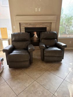 2 Leather Rocking Power Recliners