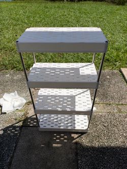 Plastic shelf, great for the bathroom