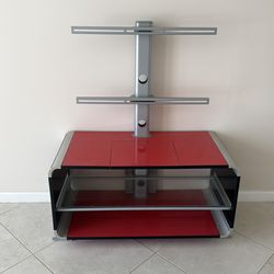 contemporary TV stand with a red and black finish with a built-in aluminium mount