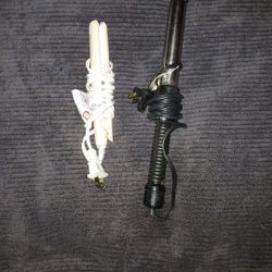 Pink mini hair straightener and black hair curler 