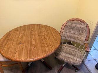 Free Table and 4 chairs. Table has attachable leaf with it