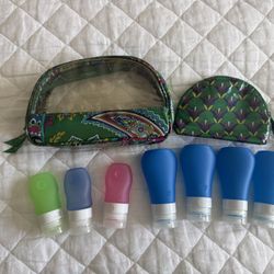Vera Bradley waterproof toiletry set and silicone travel containers. Excellent condition. Price is for all. Pet and smoke free home. Pick up Oviedo.