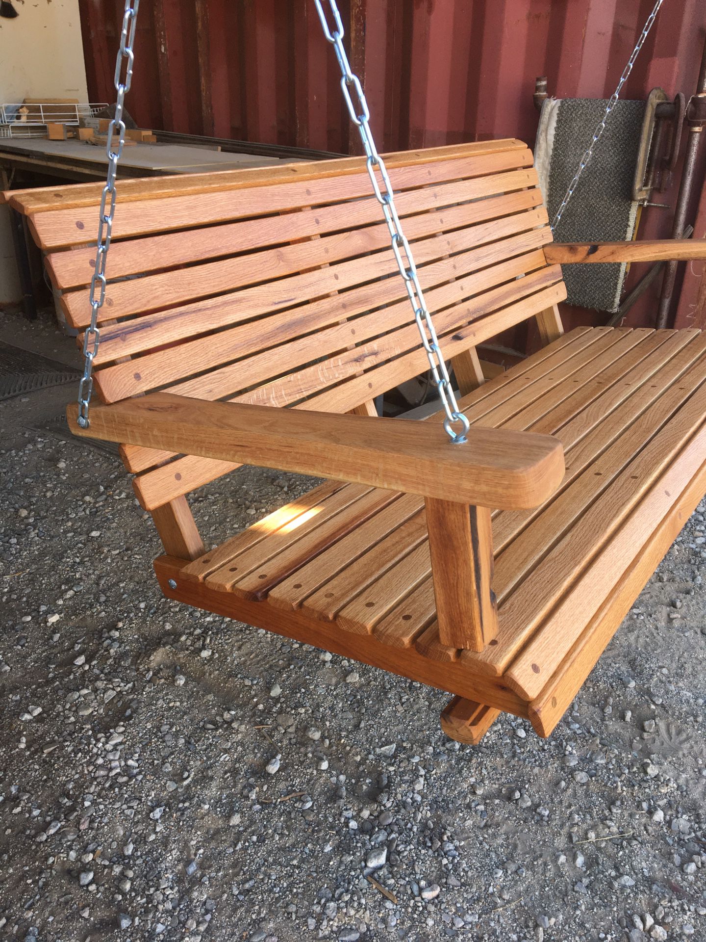RED OAK PORCH SWINGS 54” Wide. With Chain, Natural Oil Finish. $380