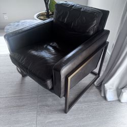 Two Brown Leather Chairs