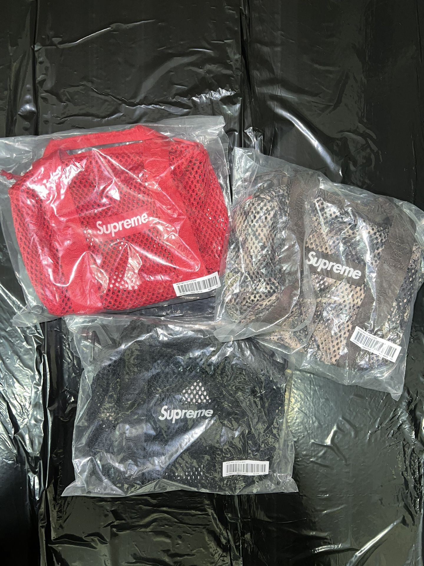 Supreme Mesh Mini Duffle Bag black red camo true timber box logo tee shirt hoodie hat jacket sweatshirt sb dunk lo backpack