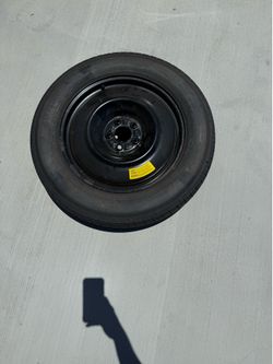 5 Lug nut universal spare tire.