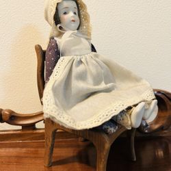 Small  historical looking doll 