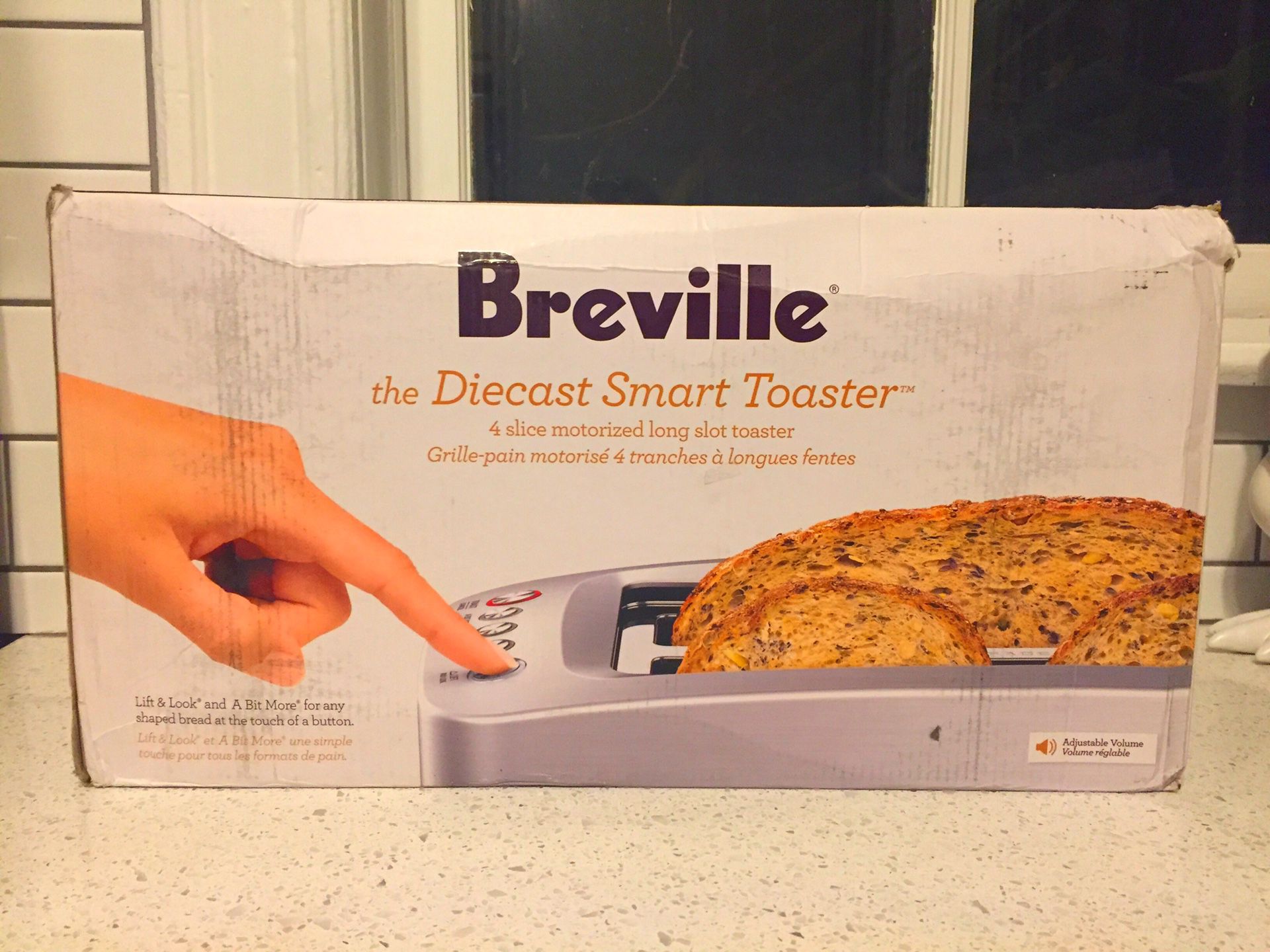Breville the Diecast Smart Toaster 4 slice motorized long slot toaster. New in Box. Retails for $180