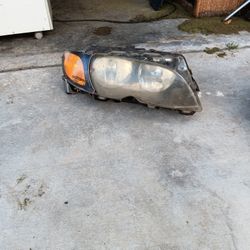 2001 BMW 325i Right Front Headlight $10.00
