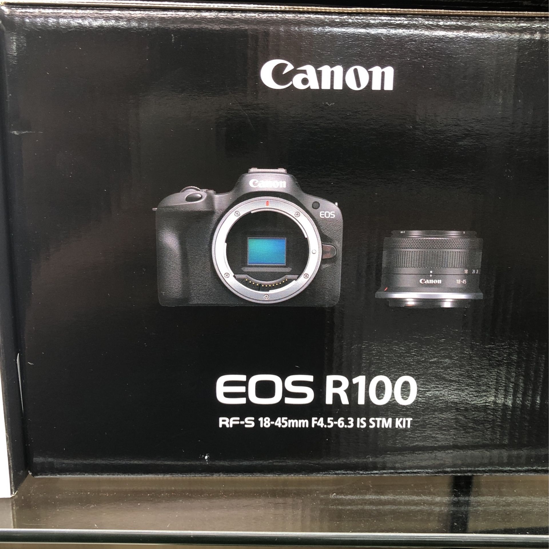 Canon EOS R100 Mirrorless Camera with 18 45mm Lens