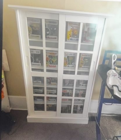I’m Selling My Nice White Cabinet With Some Pretty Cool Funko Pops For $197. I’m Looking For Buyers As Quickly As Possible