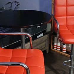 Cocktail Table With 2 RED SWIVEL CHAIRS
