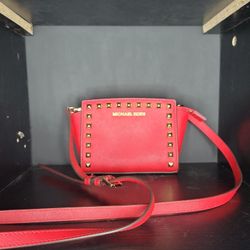 Red Michael Kors Studded Selma mini messenger