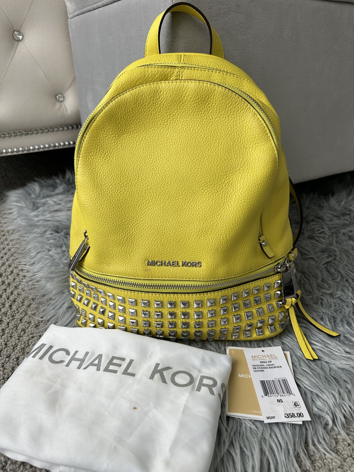 Michael Kors Rhea Studded Backpack – Canary Yellow, Bold & Stylish