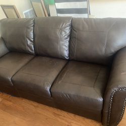Brown Sofa/Faux leather with nail accent FREE