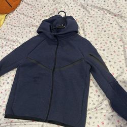 Dark blue Nike tech fleece