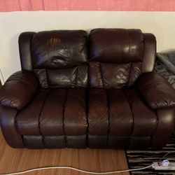 Leather reclining dual couch