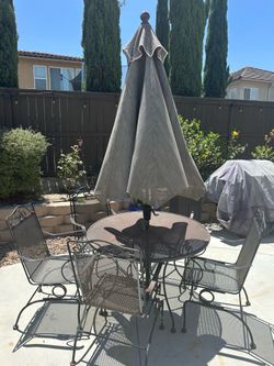 Table, 5 chairs, umbrella
