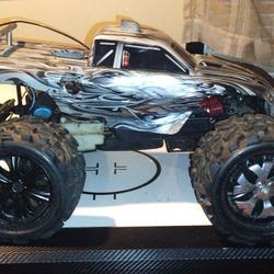 3 Traxxas trucks, 1 Traxxas electric, 