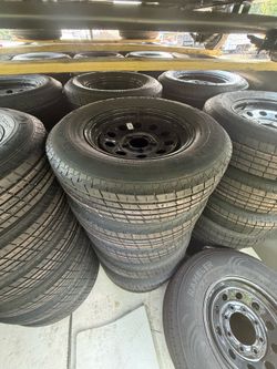 Brand new 205/75R15 Tire on 5-Lug Rim