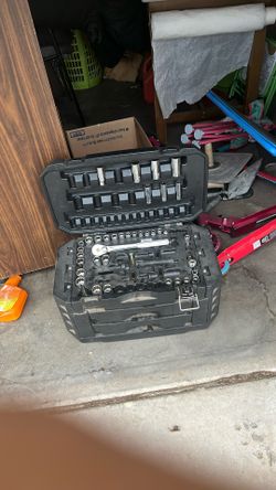 Tool Box With Some Tools Socket Wrench And Sockets