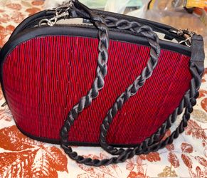 Never used. Ladies handmade purse