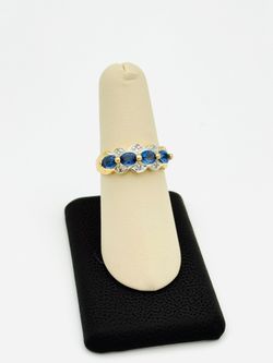 14K YELLOW GOLD 3.73G BLUE STONE CLEAR STONE RING SIZE 8.5 USED