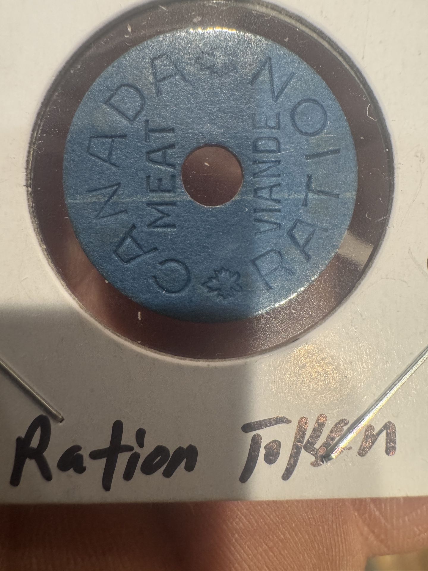 This is a Canadian WWII meat ration token.