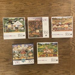 Charles Wysocki 300-Piece Puzzles…$20 for all.  Guarantee no missing pieces as I’ve done them.  $20 for all 5.  Porch pickup.  Also open to trade.