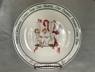 1984 Hallmark Norman Rockwell Caught Napping Christmas collector plate. 8.25”