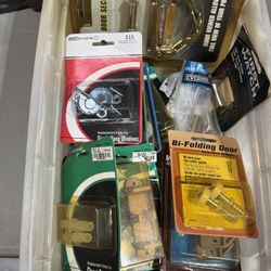 Box of Misc. hardware, includes corner braces, sliding & closet door parts, door latch, peep holes etc. priced for the lot