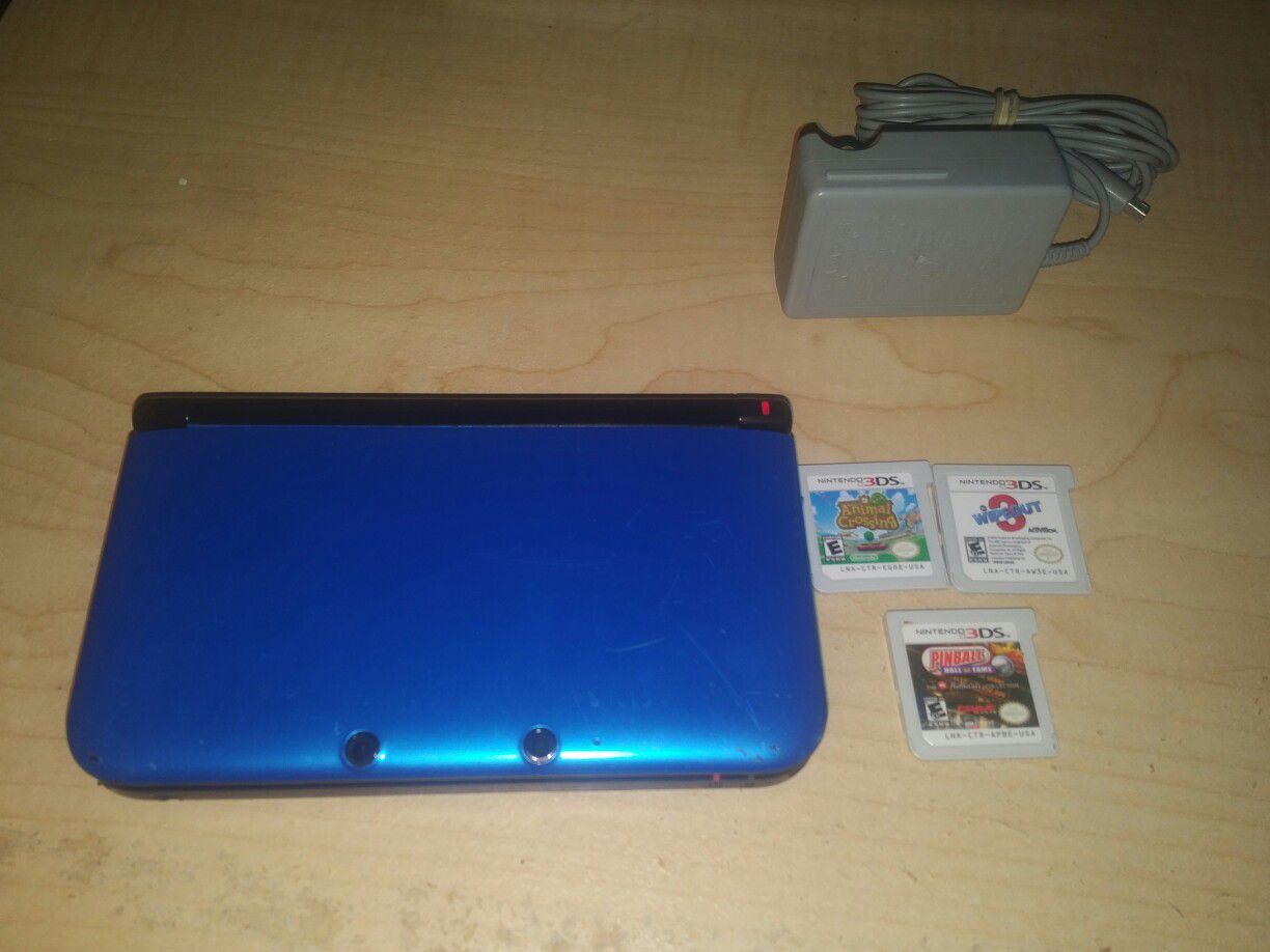 Nintendo 3ds with games and charger