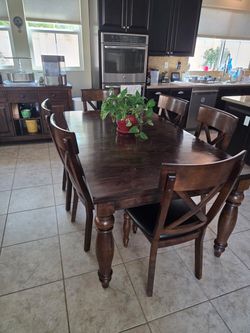 Dark Wood Dining Table with 6 Chairs