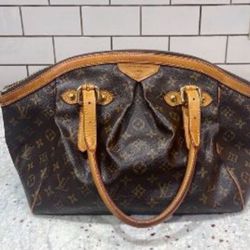 $700 really good condition Louis Vuitton purse. It was a gift from my father. Thank you.