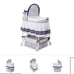 Delta Children Smooth Glide Bassinet