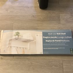 Multi use wall shelf