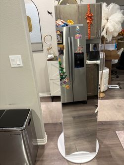 360 rotating jewelery cabinet with full length mirror