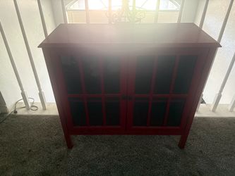 Red Wood Cabinet with Glass Panel Doors