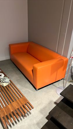 Used Orange faux-leather sofa (boxy modern)