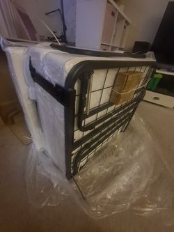 Ottoman convertible bed. Free shipping in a 25 mile radius.