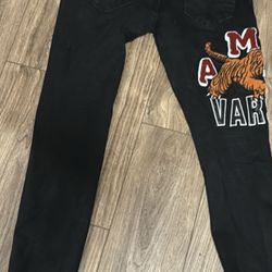 Black Amiri jeans with orange tiger design tiger design authentic