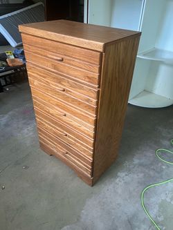 A vintage tall 5-drawer chest/dresser.