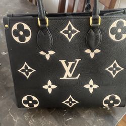 Bag By Louis Vuitton