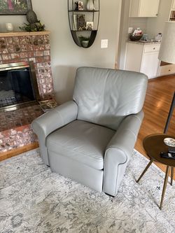Macy’s grey leather recliner