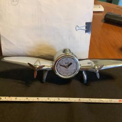 Art deco Flight Airplane Clock With Propellers, Polished Aluminum, Alarm Heavy, Airplane Is A 1930 Airplane replica stamped 1984. Hand cast airplane a