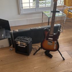 Fender Electric Guitar with case, stand and amp