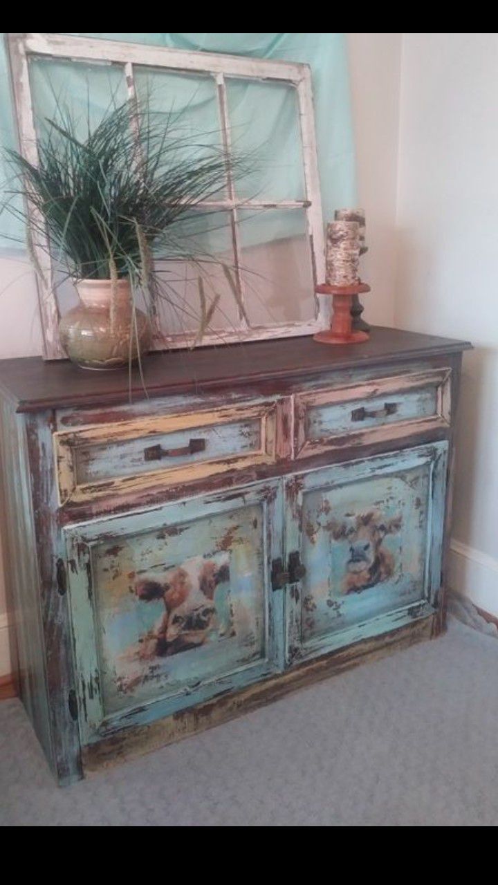 Distressed wood cow cabinet